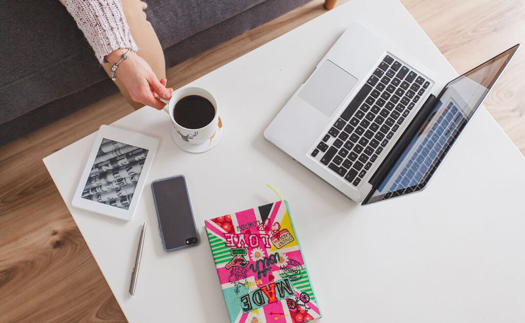 The Rise of Side Hustles: How Gen Z Is Redefining Work Top View Laptop Coffee Table 1 1024x630
